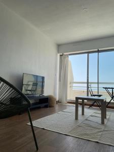 TV a/nebo společenská místnost v ubytování Duplex vue Mer