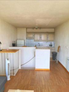 Duplex vue Mer的厨房或小厨房