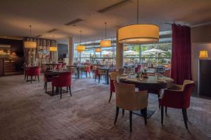 Hilton Geneva Hotel and Conference Centre餐厅或其他用餐的地方