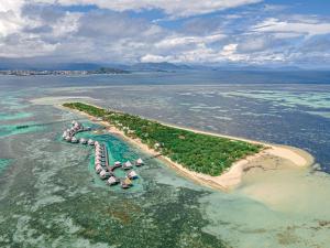 an aerial view of an island in the ocean at DoubleTree by Hilton Noumea Ilot Maitre Resort in Ilot Maitre