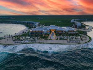 an aerial view of a resort on the beach at Hilton Tulum Riviera Maya All-Inclusive Resort in Tulum