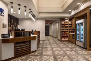 a lobby of a store with a pharmacy at DoubleTree by Hilton New York Midtown Fifth Ave in New York