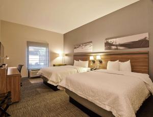 Postel nebo postele na pokoji v ubytování Hampton Inn Ciudad Juarez