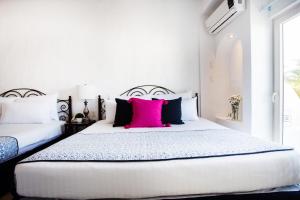 Postel nebo postele na pokoji v ubytování Hotel Suites Mar Elena