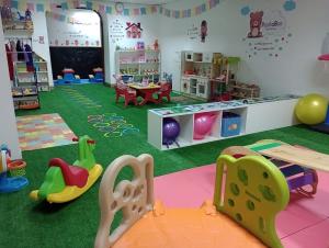 a room with many different types of toys in it at Casa Wayra Cajamarca in Cajamarca