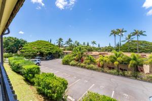 a view of a parking lot at a resort at Beautiful Ocean View Maui A Safe Place To Stay in Kahana