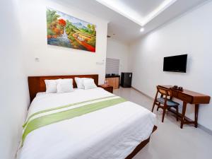TV a/nebo společenská místnost v ubytování Mora Residence