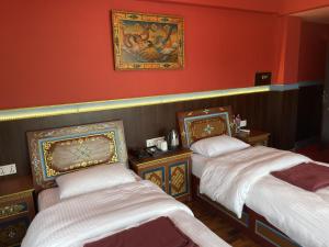 Hotel De Purang客房内的一张或多张床位