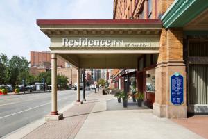 a sign for aresurance inn on a city street at Residence Inn by Marriott Cleveland Downtown in Cleveland