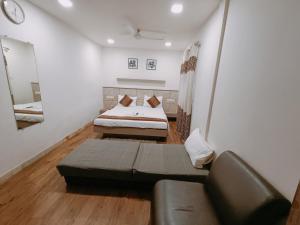 Postel nebo postele na pokoji v ubytování Hotel City Inn
