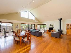 a large living room with a table and chairs at Sky Blue Retreat in North Boyanup