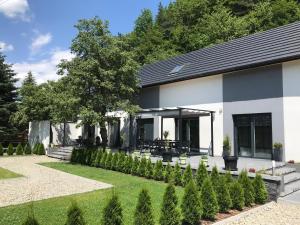 Vonkajšia záhrada v ubytovaní Domek szeregowy NR1