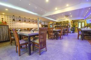 Restaurant o iba pang lugar na makakainan sa FabEscape Sion Resort With Pool, Candolim