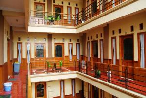 a view of the inside of a building at Orange Home Syariah in Bandung