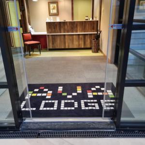 a view of a lobby from a glass door at Ava Lodge in Lower Hutt