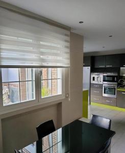A kitchen or kitchenette at Casa Pablo Picasso 9