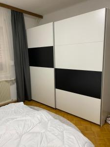 Postel nebo postele na pokoji v ubytování Ferienwohnung- Südsteirischer Traum