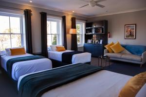 Khu vực ghế ngồi tại Bayswater Boutique Lodge - Potts Point