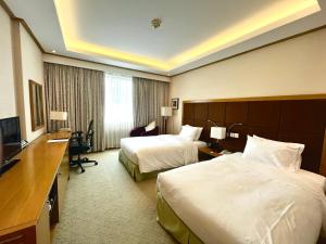 TV a/nebo společenská místnost v ubytování Hilton Garden Inn Hanoi
