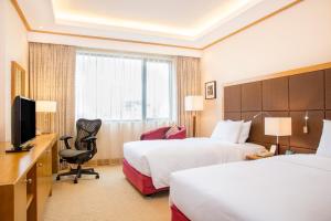 TV a/nebo společenská místnost v ubytování Hilton Garden Inn Hanoi