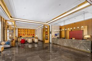 Posezení v ubytování Lucky Holiday International Hotel Pazhou Convention and Exhibition Center Zhujiang New Town Branch - Free Shuttle Bus to Canton Fair Complex During Canton Fair Period & Overseas Buyers Registration Service & Free VPN Internet Access