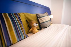 Postel nebo postele na pokoji v ubytování Ukiyo Suites