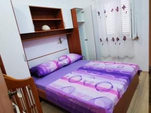 Postel nebo postele na pokoji v ubytování Apartments Miramaris