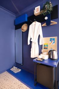 Postel nebo postele na pokoji v ubytování Ukiyo Suites