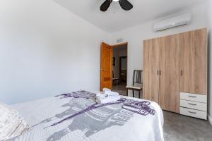 Posteľ alebo postele v izbe v ubytovaní La Casa de los Recuerdos