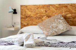 Posteľ alebo postele v izbe v ubytovaní La Casa de los Recuerdos