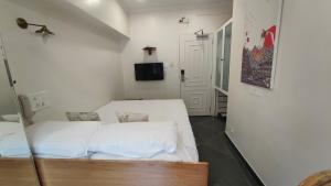 Letto o letti in una camera di Hotel Kemps Corner