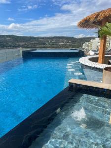Bazén v ubytování Damare Resort & SPA nebo v jeho okolí
