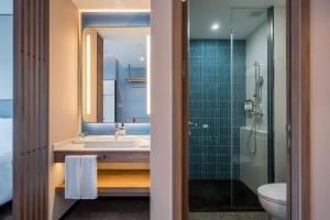 Ein Badezimmer in der Unterkunft Holiday Inn Express Jiangmen East Station, an IHG Hotel