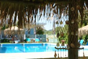 Bazén v ubytovaní Cormoranos Apartments Eco Green alebo v jeho blízkosti