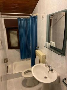 a bathroom with a sink and a toilet and a mirror at Room in Sukosan with balcony, air conditioning, WiFi 5188-3 in Sukošan