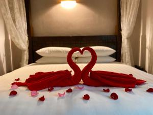 Postel nebo postele na pokoji v ubytování Hotel Richbaliz Selayang