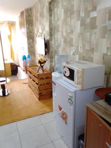 Küche/Küchenzeile in der Unterkunft Tsavo 90 degrees smart view