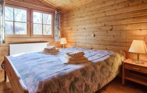 Postel nebo postele na pokoji v ubytování Werrapark Resort Ferienhäuser Am Sommerberg Premium