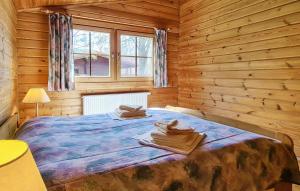 Postel nebo postele na pokoji v ubytování Werrapark Resort Ferienhäuser Am Sommerberg Premium