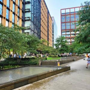 a fountain in a park in a city with buildings at London Apartment - Near Kings Cross St Pancreas! in London