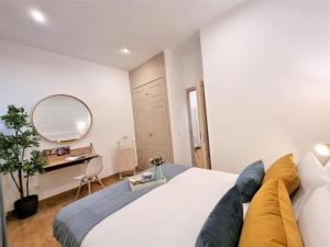 Postel nebo postele na pokoji v ubytování APARTAMENTOS SAN ANDRES