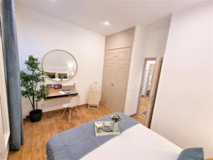 Postel nebo postele na pokoji v ubytování APARTAMENTOS SAN ANDRES