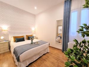 Postel nebo postele na pokoji v ubytování APARTAMENTOS SAN ANDRES