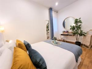Postel nebo postele na pokoji v ubytování APARTAMENTOS SAN ANDRES