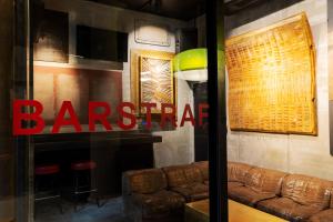 A seating area at STRAF, Milan, a Member of Design Hotels