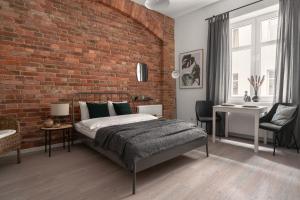 Posteľ alebo postele v izbe v ubytovaní HARBOR APARTMENTS - Damrota