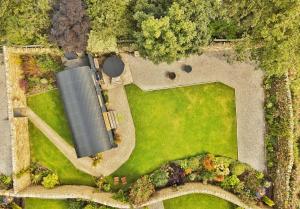 an overhead view of a garden with a building at FLORA Luxury Retreat, Private Garden, Views & Hot Tub in Durham