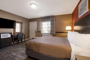 Postel nebo postele na pokoji v ubytování Rodeway Inn near Coachella