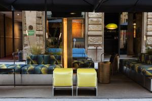A seating area at STRAF, Milan, a Member of Design Hotels