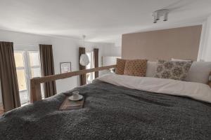 Posteľ alebo postele v izbe v ubytovaní HARBOR APARTMENTS - Damrota